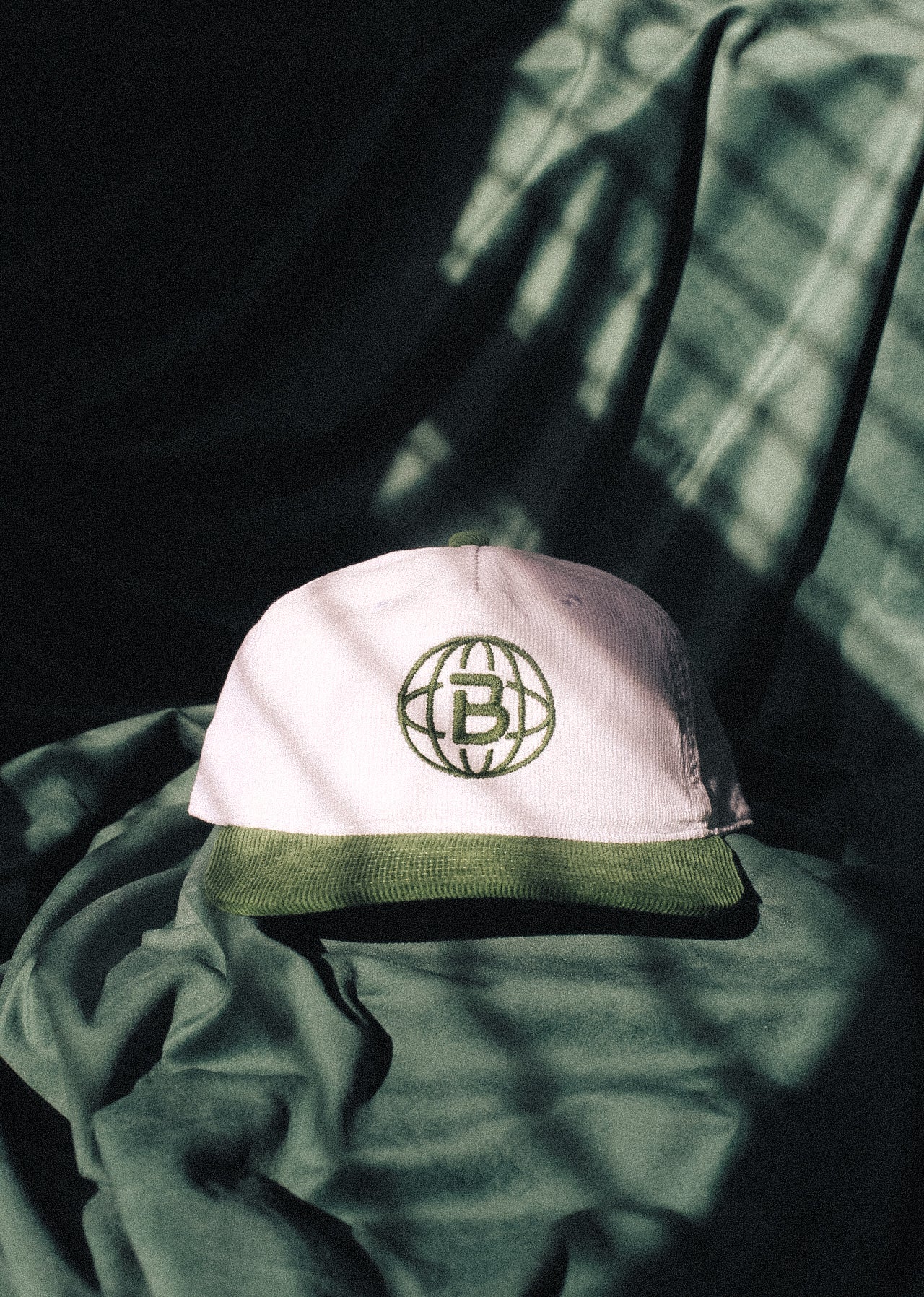 "Bellworld" corded hat